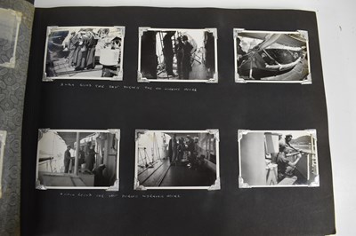 Lot 31 - A photograph album of naval photographs taken...