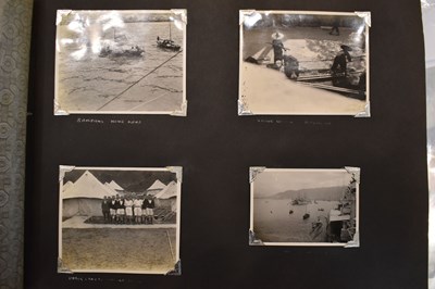 Lot 31 - A photograph album of naval photographs taken...