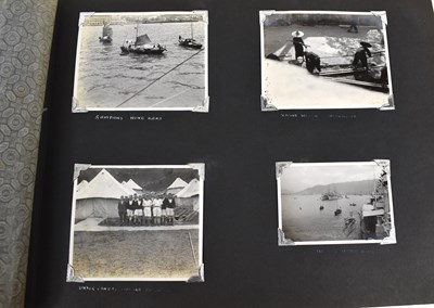 Lot 31 - A photograph album of naval photographs taken...