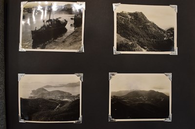 Lot 31 - A photograph album of naval photographs taken...