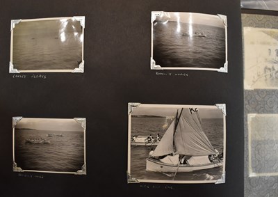 Lot 31 - A photograph album of naval photographs taken...