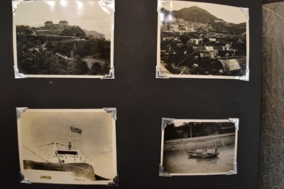 Lot 31 - A photograph album of naval photographs taken...