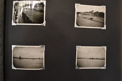 Lot 31 - A photograph album of naval photographs taken...