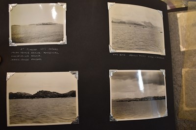 Lot 31 - A photograph album of naval photographs taken...