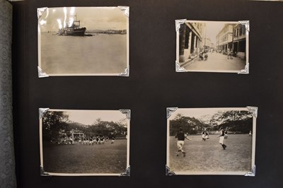 Lot 31 - A photograph album of naval photographs taken...