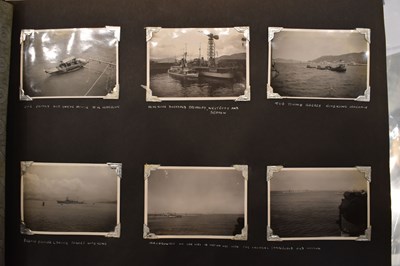 Lot 31 - A photograph album of naval photographs taken...