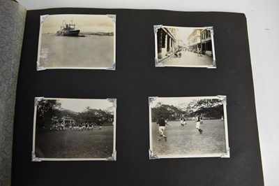 Lot 31 - A photograph album of naval photographs taken...