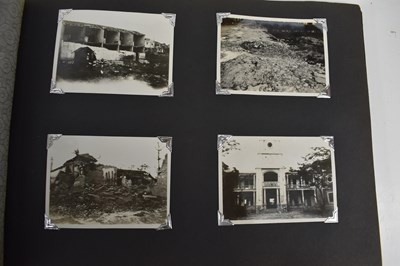 Lot 31 - A photograph album of naval photographs taken...