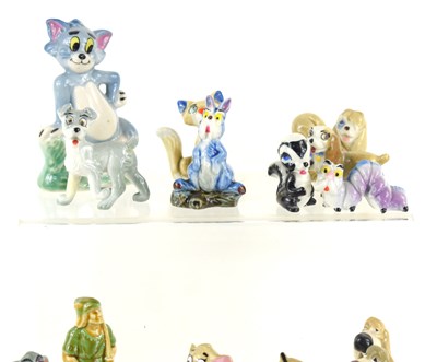Lot 155 - A collection of Wade Whimsies and figurines to...