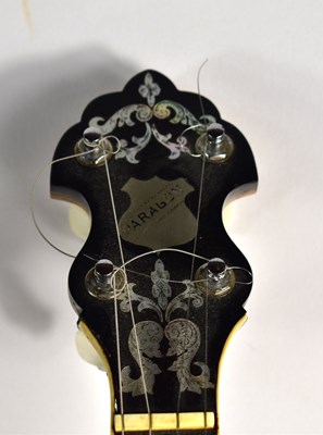 Lot 181 - A Clifford Essex "Paragon" four string banjo,...