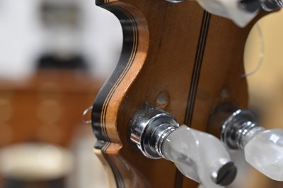 Lot 181 - A Clifford Essex "Paragon" four string banjo,...