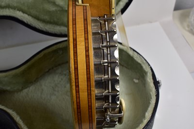 Lot 181 - A Clifford Essex "Paragon" four string banjo,...