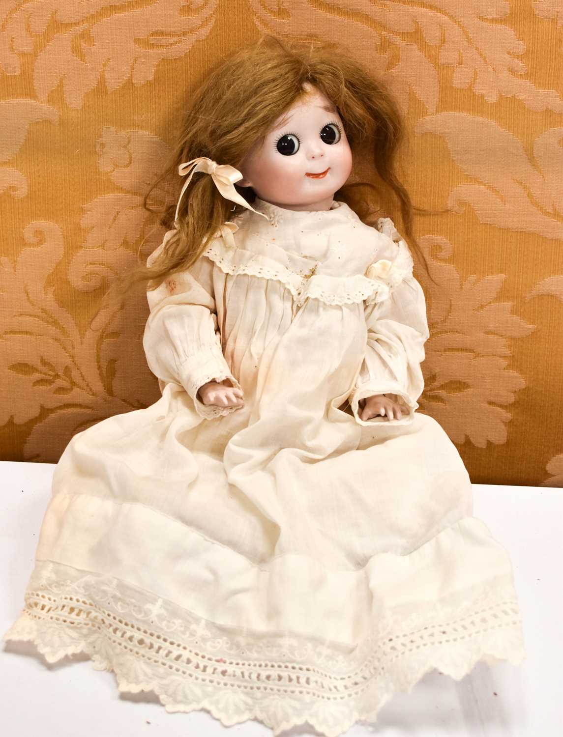 Lot 38 - A Kestner Kewpie bisque head doll, marked JDK...