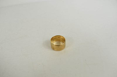 Lot 52 - A 9ct gold wedding band, size K/L, 5.5g.