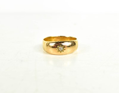 Lot 51 - A 9ct gold and diamond ring, the single...