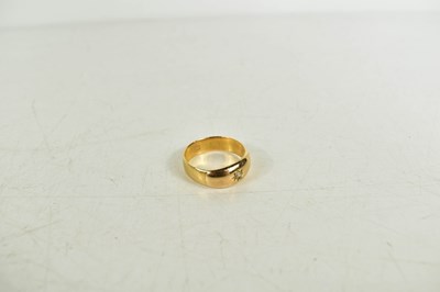 Lot 51 - A 9ct gold and diamond ring, the single...