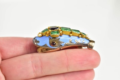 Lot 27 - A gold, blue enamel, emerald and ruby brooch...