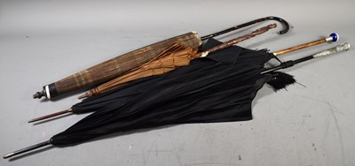 Lot 171 - A group of four Victorian parasols comprising...