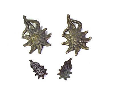 Lot 425 - A group of German WWII Edelweiss badges, the...