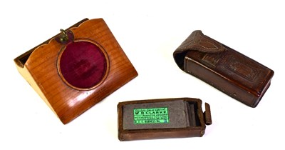 Lot 554 - A 19th century Mauchline Ware cedar wood watch...