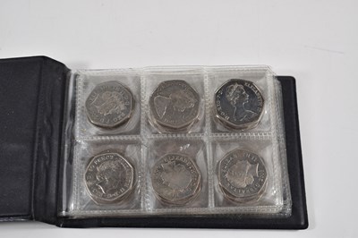 Lot 153 - An album of fifty pences to include a 2009 Kew...