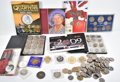 Lot 154 - A collection of coins to include a Queen...