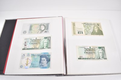 Lot 155 - An album of British and worldwide banknotes to...
