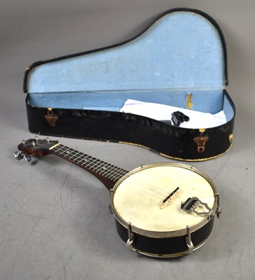 Lot 351 - A vintage British made four string banjo with...