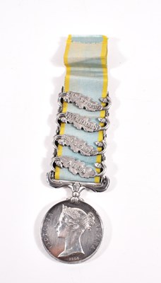 Lot 429 - An 1854 Crimea War medal with four clasps,...