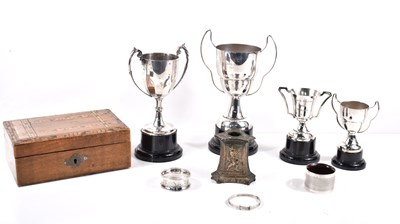 Lot 570 - A group of silver plated trophies together...
