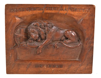 Lot 191 - A 19th century Swiss wood panel, carved in...