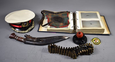 Lot 363 - A group of militaria to include a vintage...
