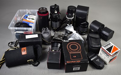 Lot 387 - A collection of vintage camera lens and...