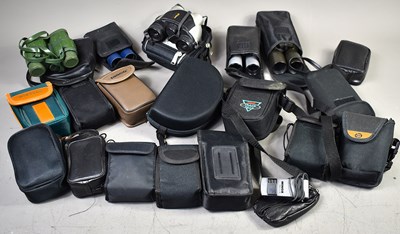 Lot 385 - A collection of binoculars and monoculars to...