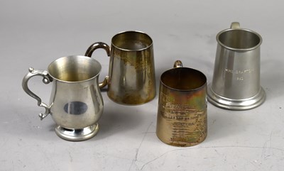 Lot 65 - A silver tankard with presentation inscription...