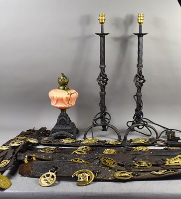 Lot 368 - A collection of horse brasses on leather...