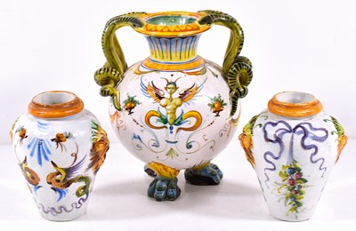 Lot 325 - A 19th century Majolica vase with double snake...
