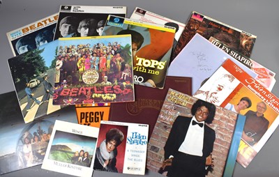 Lot 434 - A group of vinyl records to include Beatles...