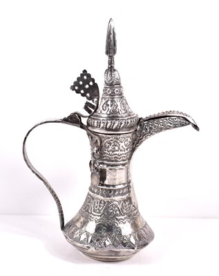 Lot 68 - An early 20th century white metal Omani Dallah...