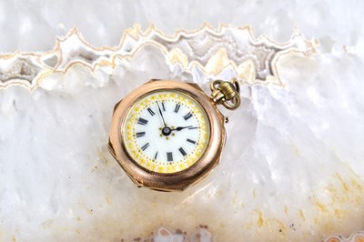 Lot 105 - A 12ct gold ladies pocket watch, white enamel...