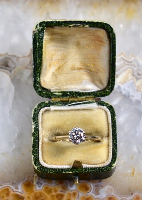Lot 89 - A 9ct gold and diamond solitaire ring, size...