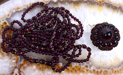 Lot 48 - A vintage multi strand garnet bead necklace...