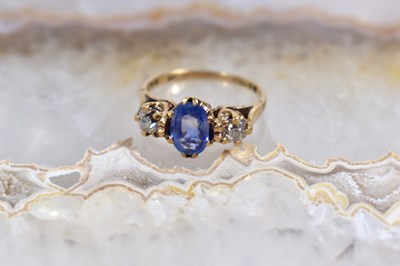 Lot 62 - A 9ct gold, blue topaz and paste ring, size K,...
