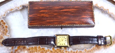 Lot 8 - A Longines Art Deco period 14ct gold...