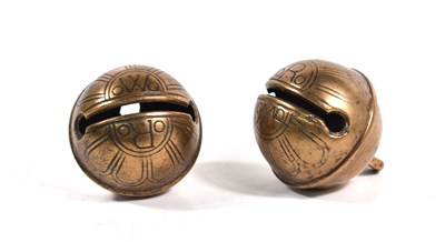 Lot 559 - Two bronze crotal bells by Robert Wells of...