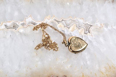 Lot 56 - A 9ct gold necklace and a gold plated heart...