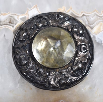 Lot 28 - A Scottish white metal and paste brooch, the...