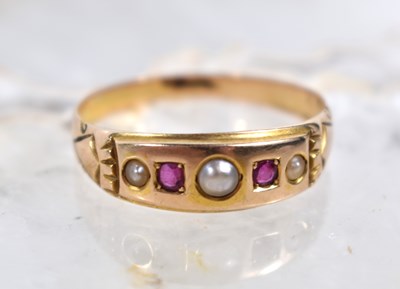 Lot 83 - An antique gold, ruby and seed pearl ring,...