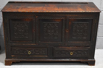 Lot 624 - A 19 century carved oak mule chest in the...