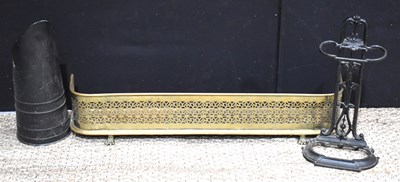 Lot 354 - A brass fire fender together with an umbrella...